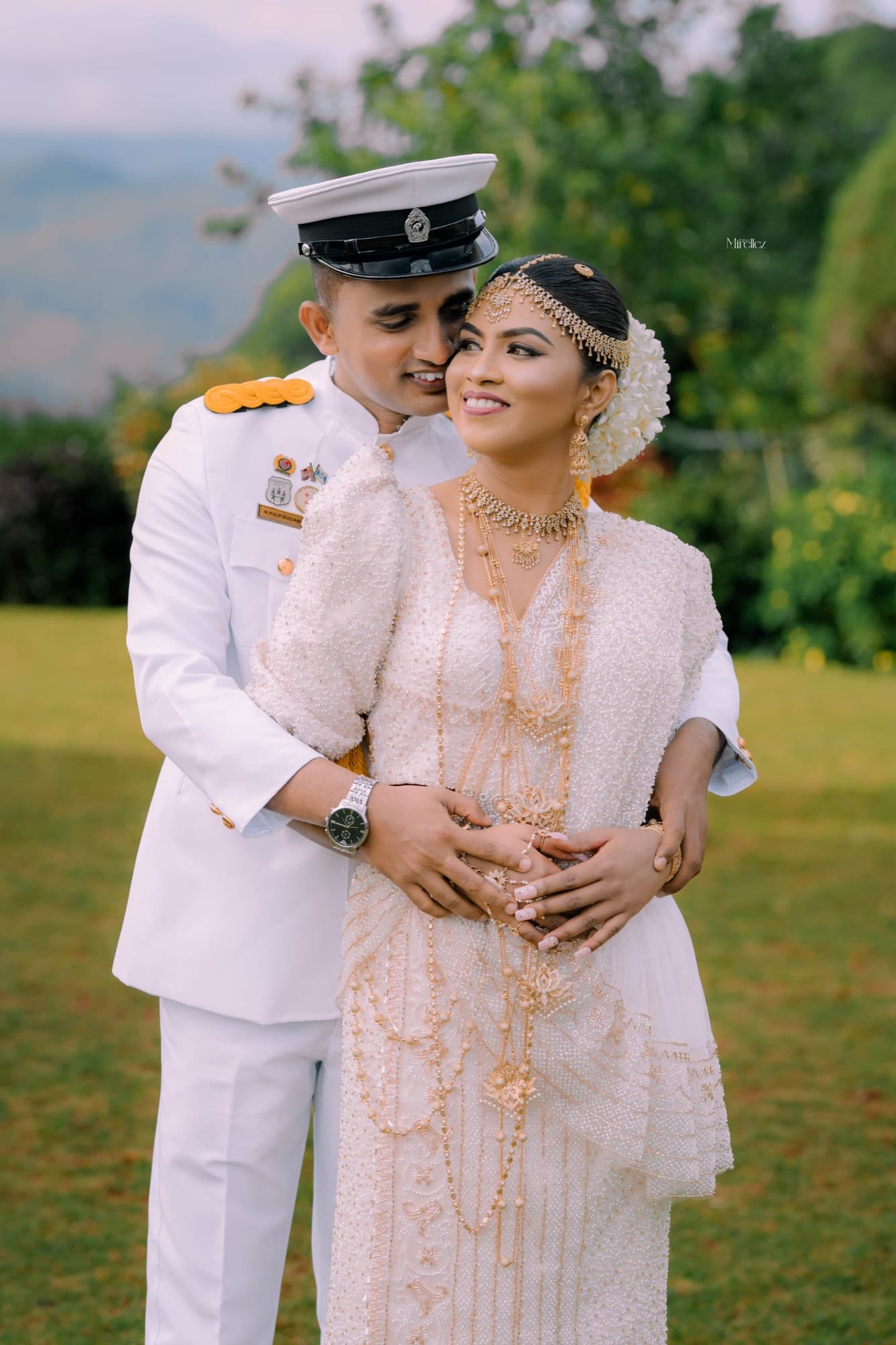 Bride and groom in a close wedding-day embrace